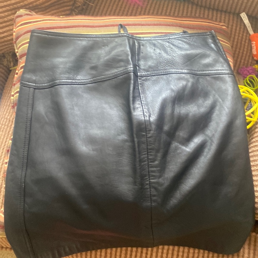 Black leather skirt.